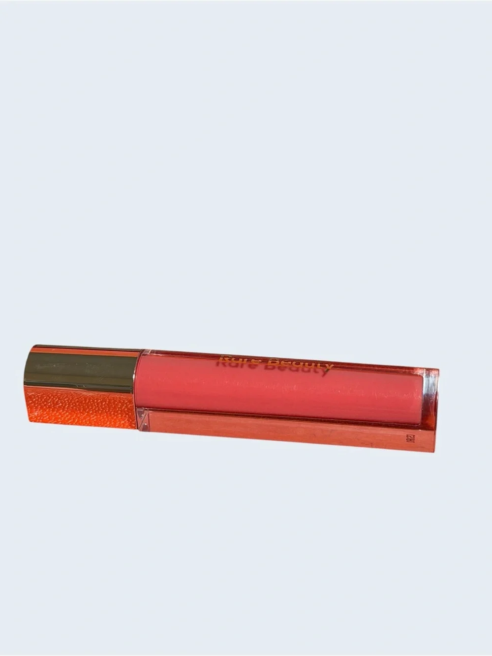 Rare Beauty Lip Gloss  in NEARLY APRICOT